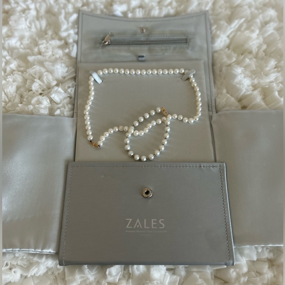 Cultured Freshwater Pearls set in 14k yellow gold.